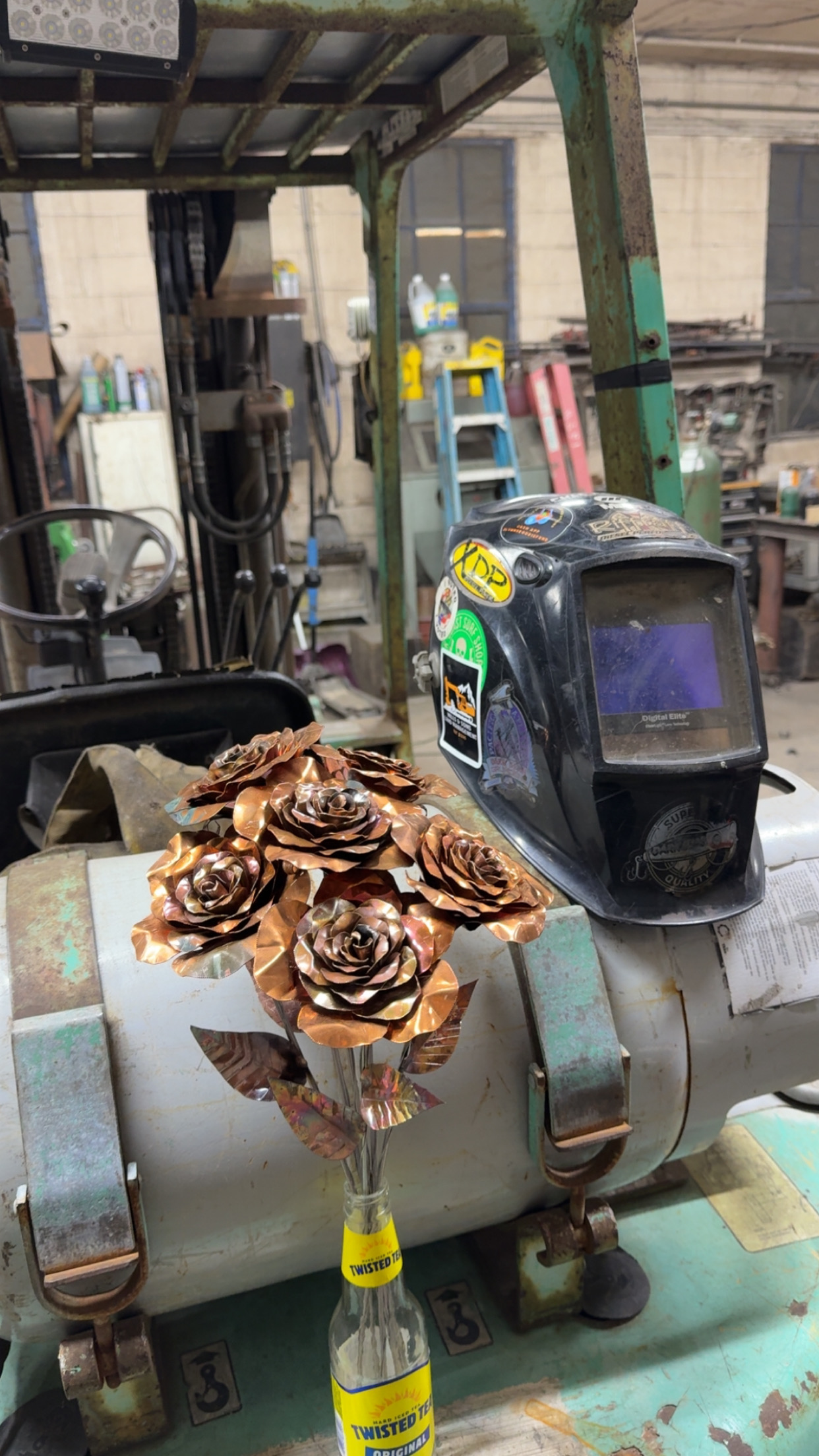 Bouquet of hand-formed copper roses with heat-colored petals